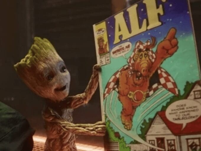 Groot holding a comic