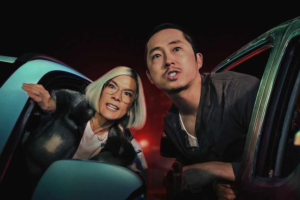 A Movie Poster With Two Characters in Color