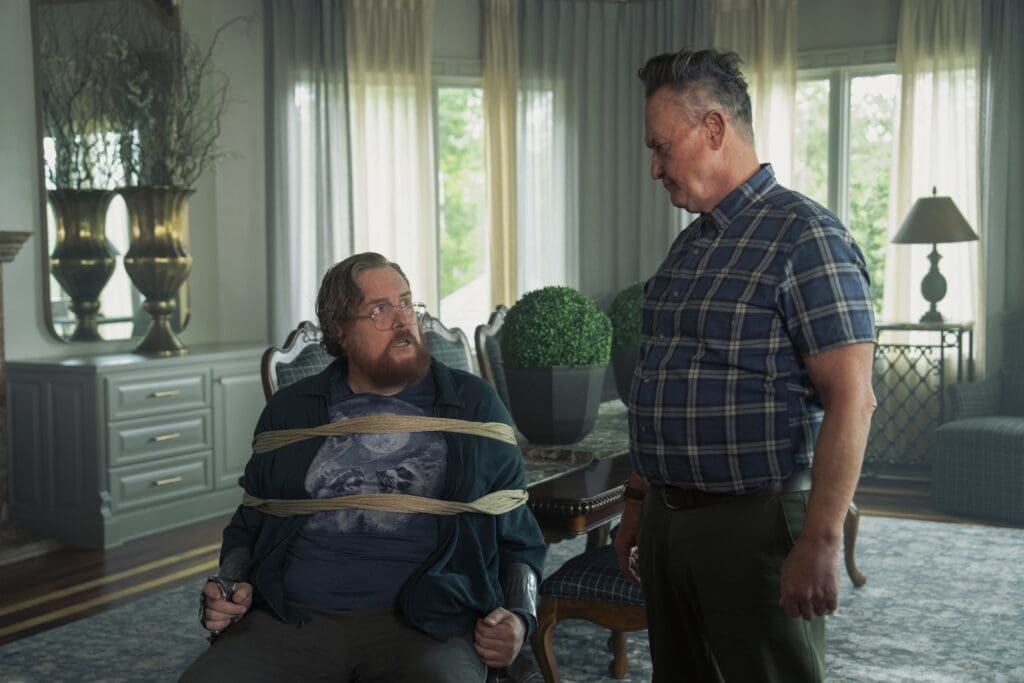 Steve Agee & Robert Patrick in PEACEMAKER Season 2 Episode 7. Photograph by Jessica Miglio/HBO Max