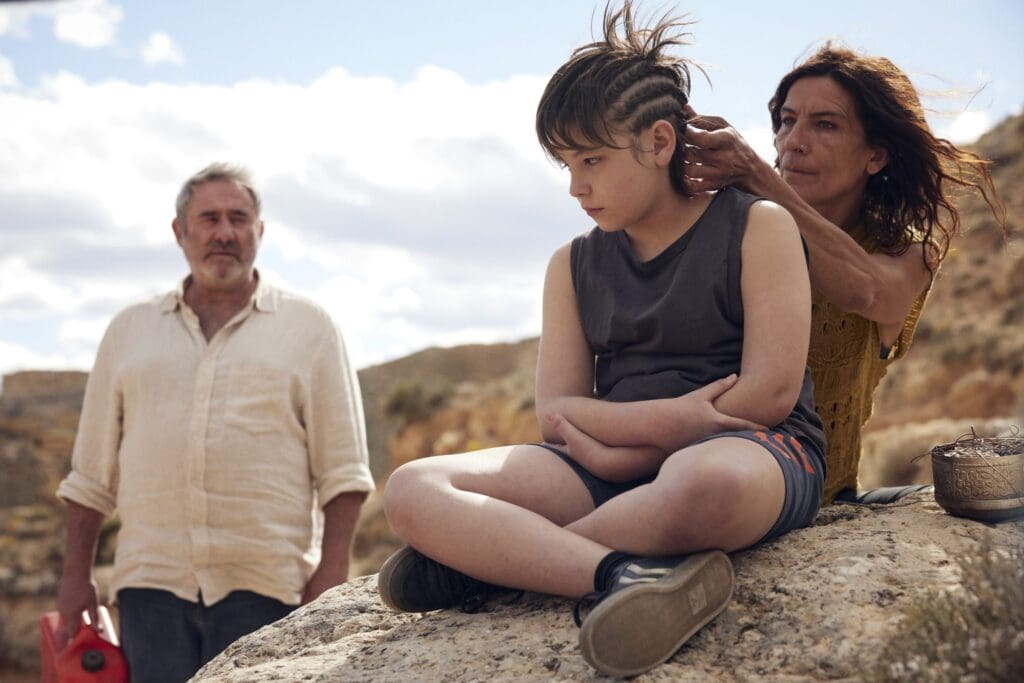 Sergi López, Bruno Núñez Arjona and Stefania Gadda in 'Sirât.' Courtesy of Neon.