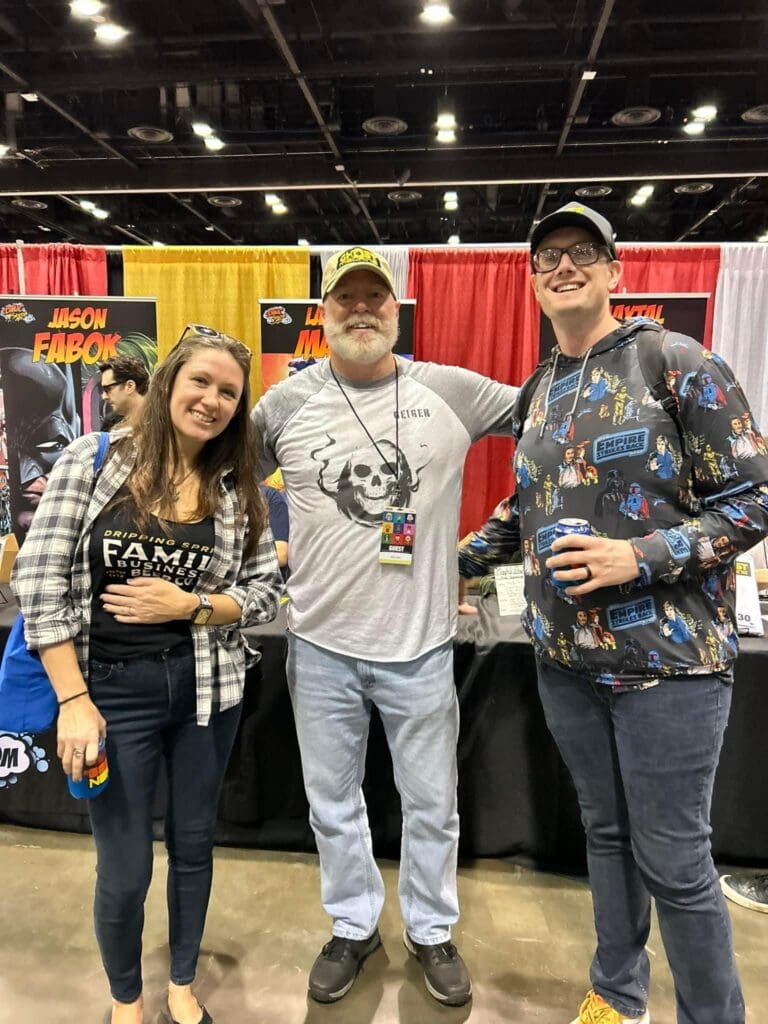Rob Leigh from Ghost Machine at Image Comics at MEGACON Orlando 2024 with Matt & Lauren from 'Nerd Initiative' and 'Hops GEEK News.'