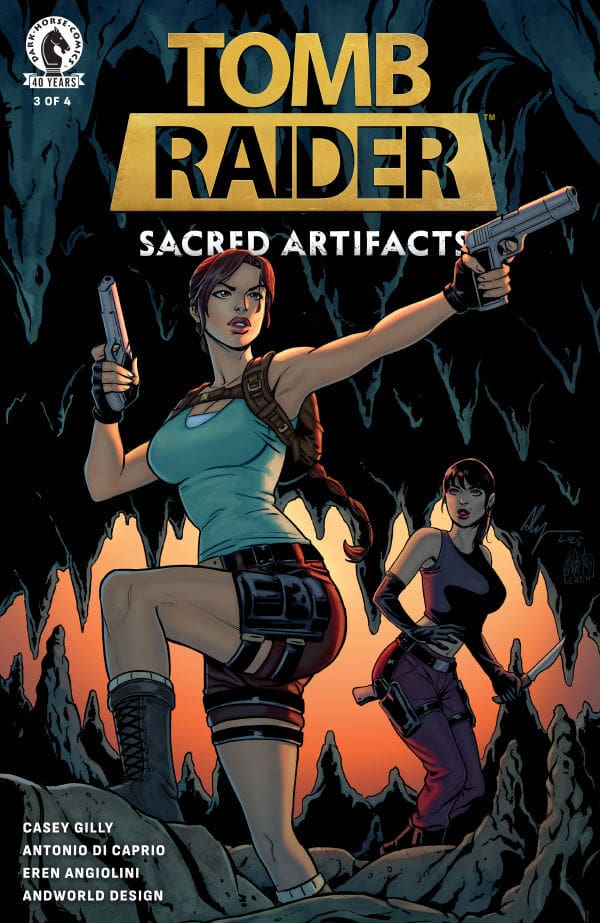 Comic cover for Tomb Raider: Sacred Artifacts, issue 3 of 4, showing Lara Croft aiming two pistols in a cave with a sunset glow and a companion behind her, logo and credits visible on the left.