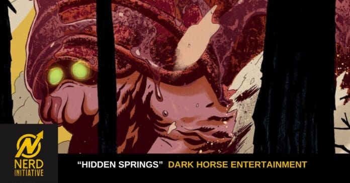 Comic panel featuring a red, monstrous figure with glowing green eyes peeking between dark trees; banner reads 'Hidden Springs' and 'Dark Horse Entertainment' with Nerd Initiative logo in corner.