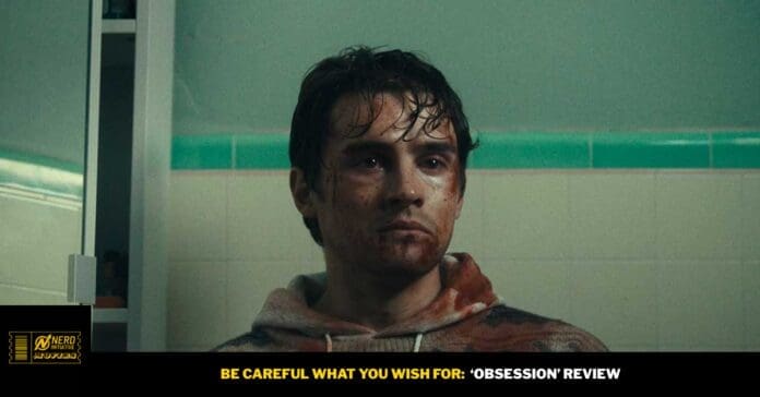 Young man with a bloodied face in a hoodie standing in a tiled bathroom.
