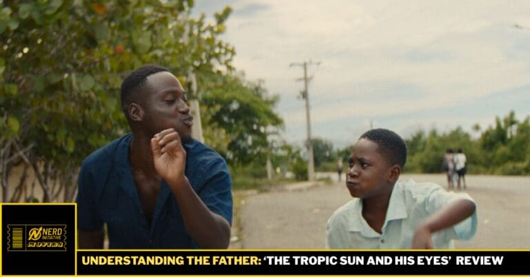 Two young men on a rural street share a playful moment, one making a puckered face toward the other, with a black-and-yellow banner bar reading 'Understanding the Father: The Tropic Sun and His Eyes' at the bottom.