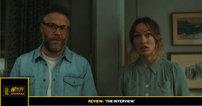 Two adults stand in a doorway, both looking at the camera with surprised expressions.