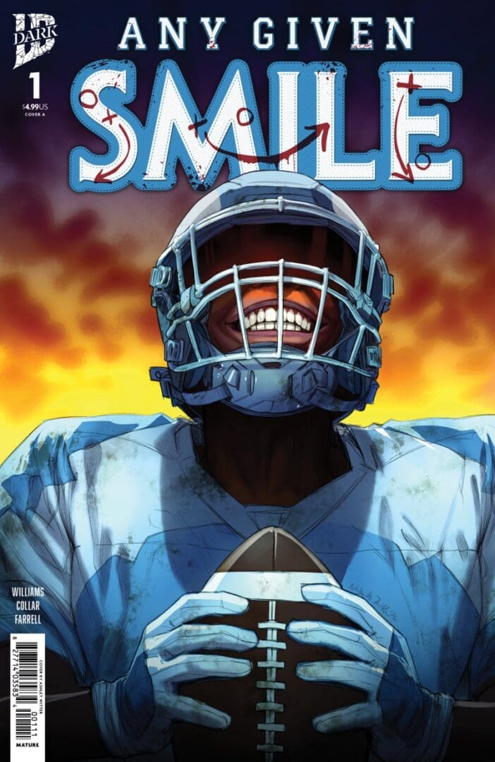 Man wearing a football helmet and holding a football smiling